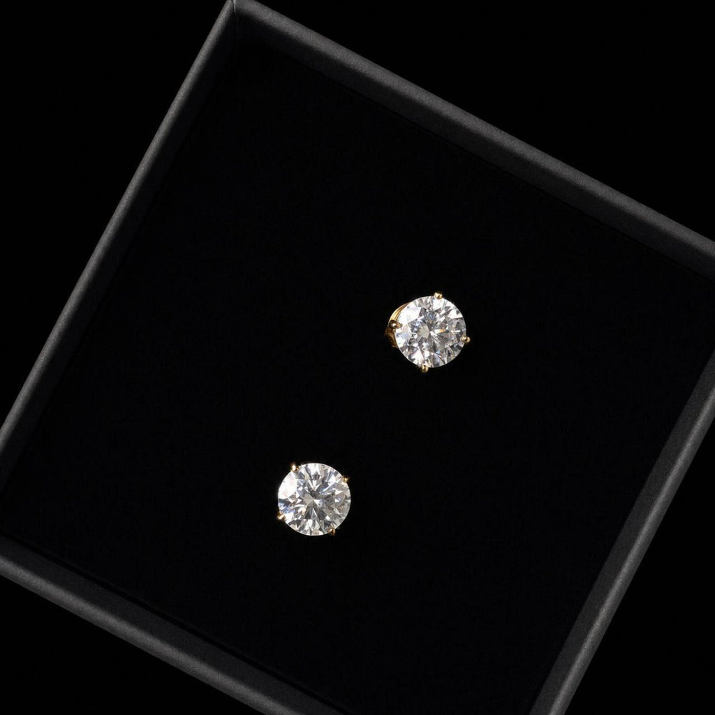 Elegant classic stud earrings featuring 1ct round moissanite stones with D Colour and VVS1 Clarity for exceptional brilliance and clarity.