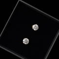 Elegant classic stud earrings featuring 1ct round moissanite stones with D Colour and VVS1 Clarity for exceptional brilliance and clarity.