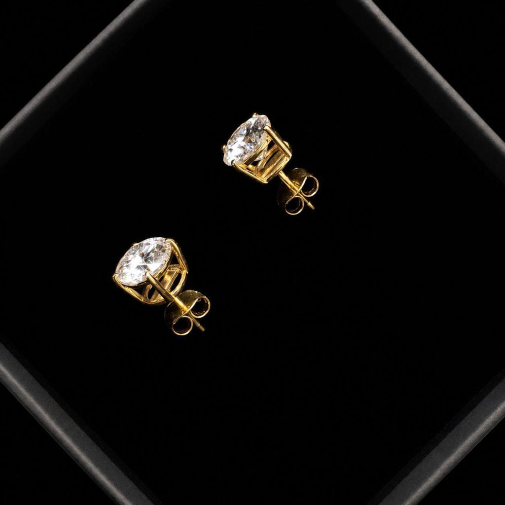 Elegant classic stud earrings featuring 1ct round moissanite stones with D Colour and VVS1 Clarity for exceptional brilliance and clarity.