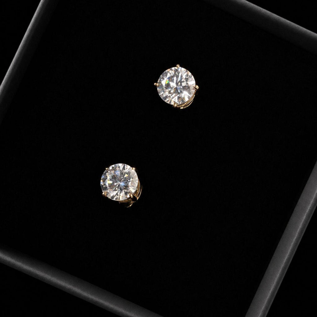 Elegant classic stud earrings featuring 1ct round moissanite stones with D Colour and VVS1 Clarity for exceptional brilliance and clarity.