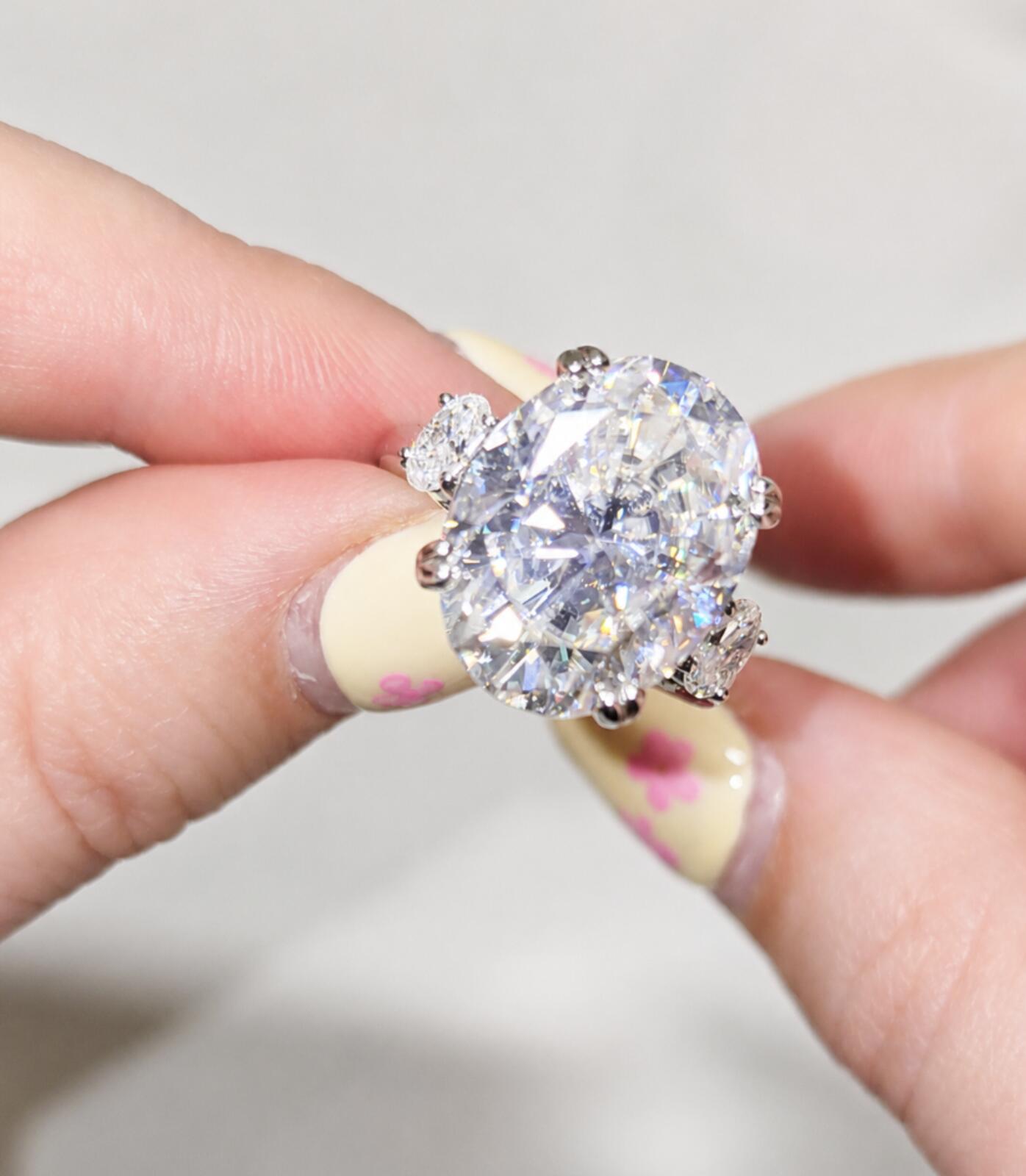 Oval Cut 10.48ct Moissanite Ring with Platinum Overlay