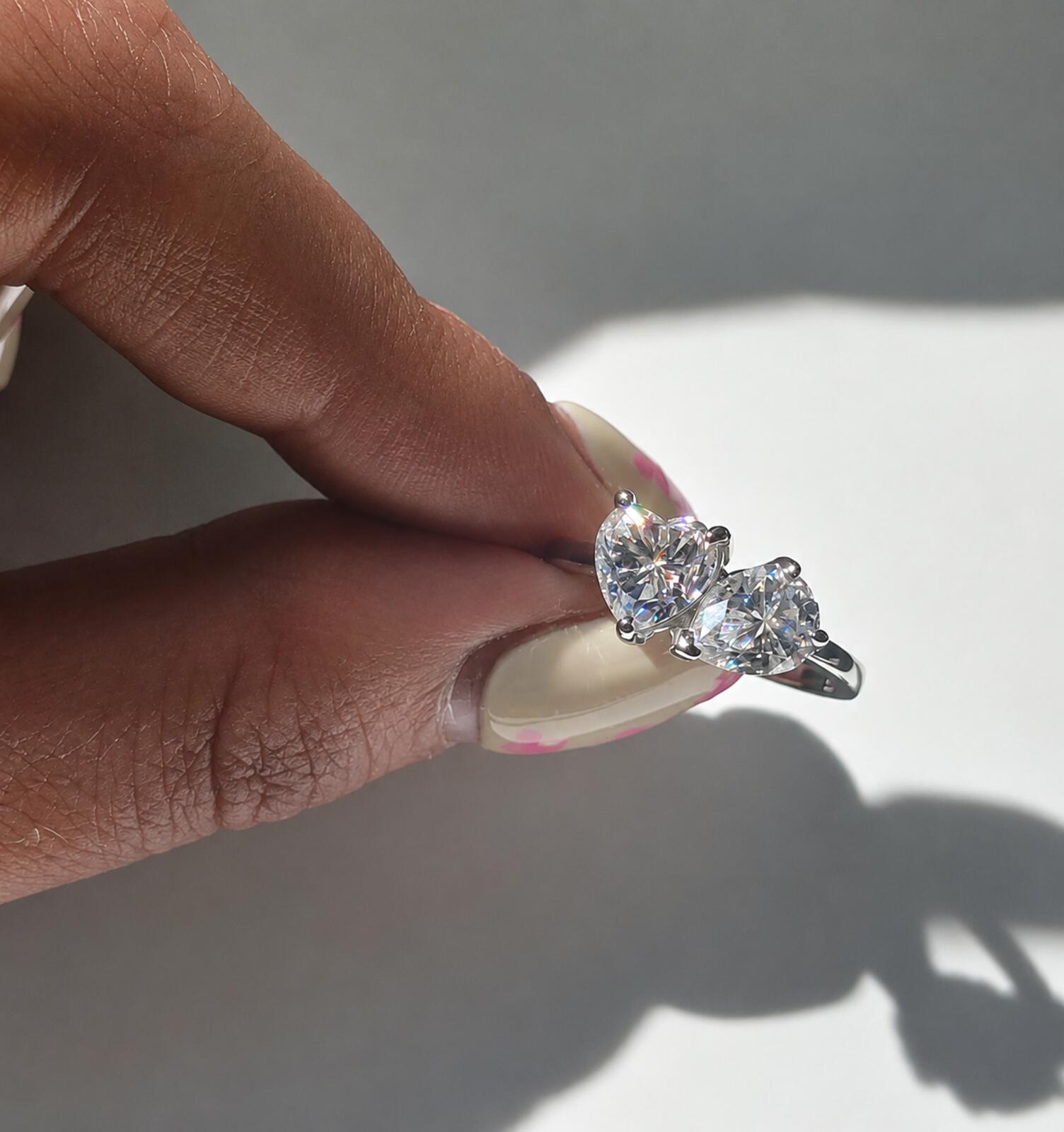 2.4ct TCW moissanite toi-et-moi ring platinum overlay