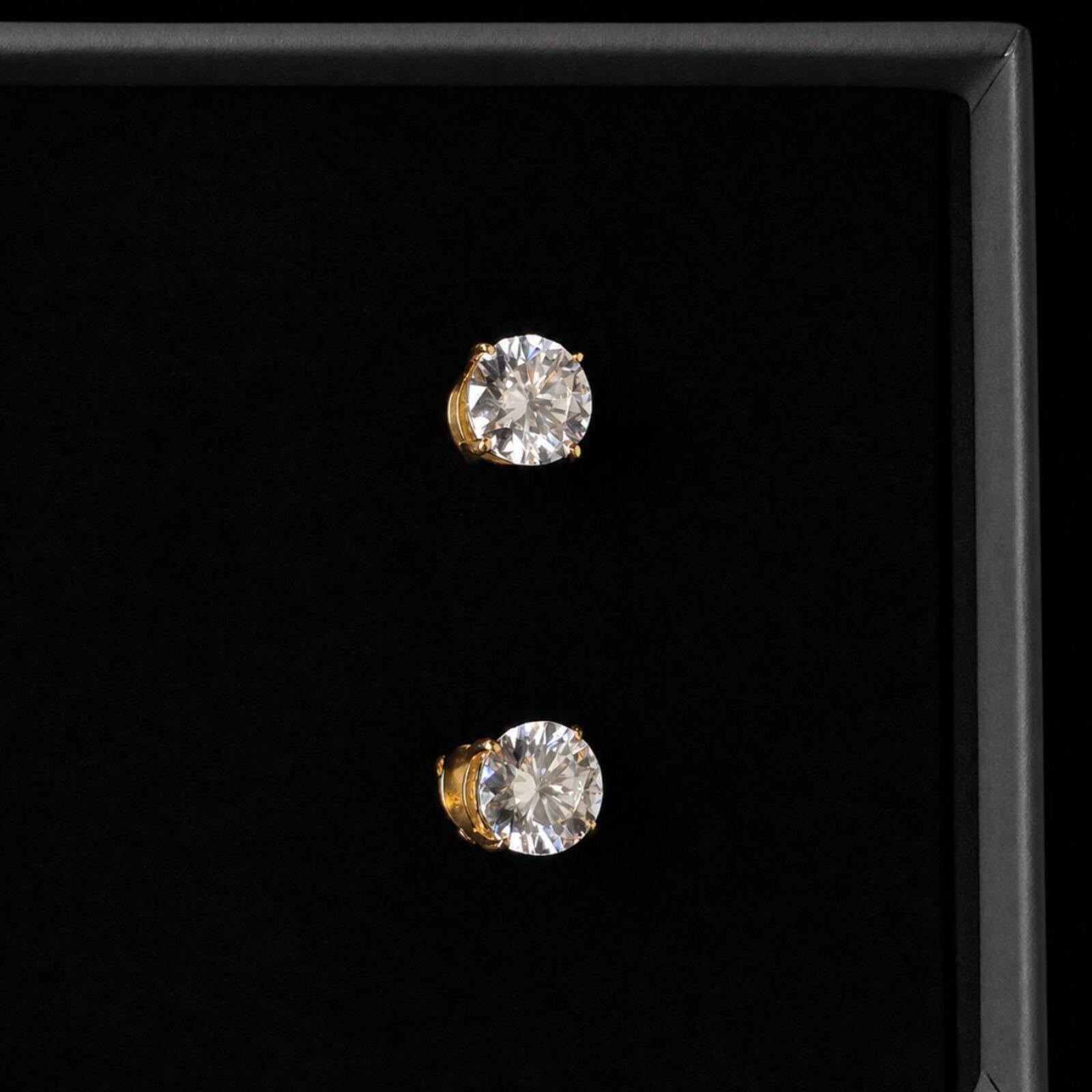Elegant classic stud earrings featuring 1ct round moissanite stones with D Colour and VVS1 Clarity for exceptional brilliance and clarity.