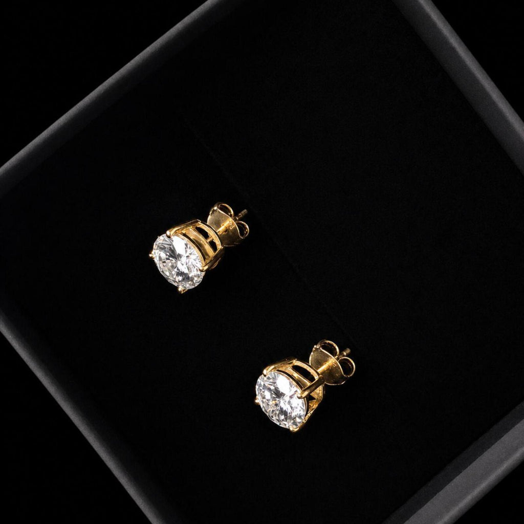 Elegant classic stud earrings featuring 1ct round moissanite stones with D Colour and VVS1 Clarity for exceptional brilliance and clarity.