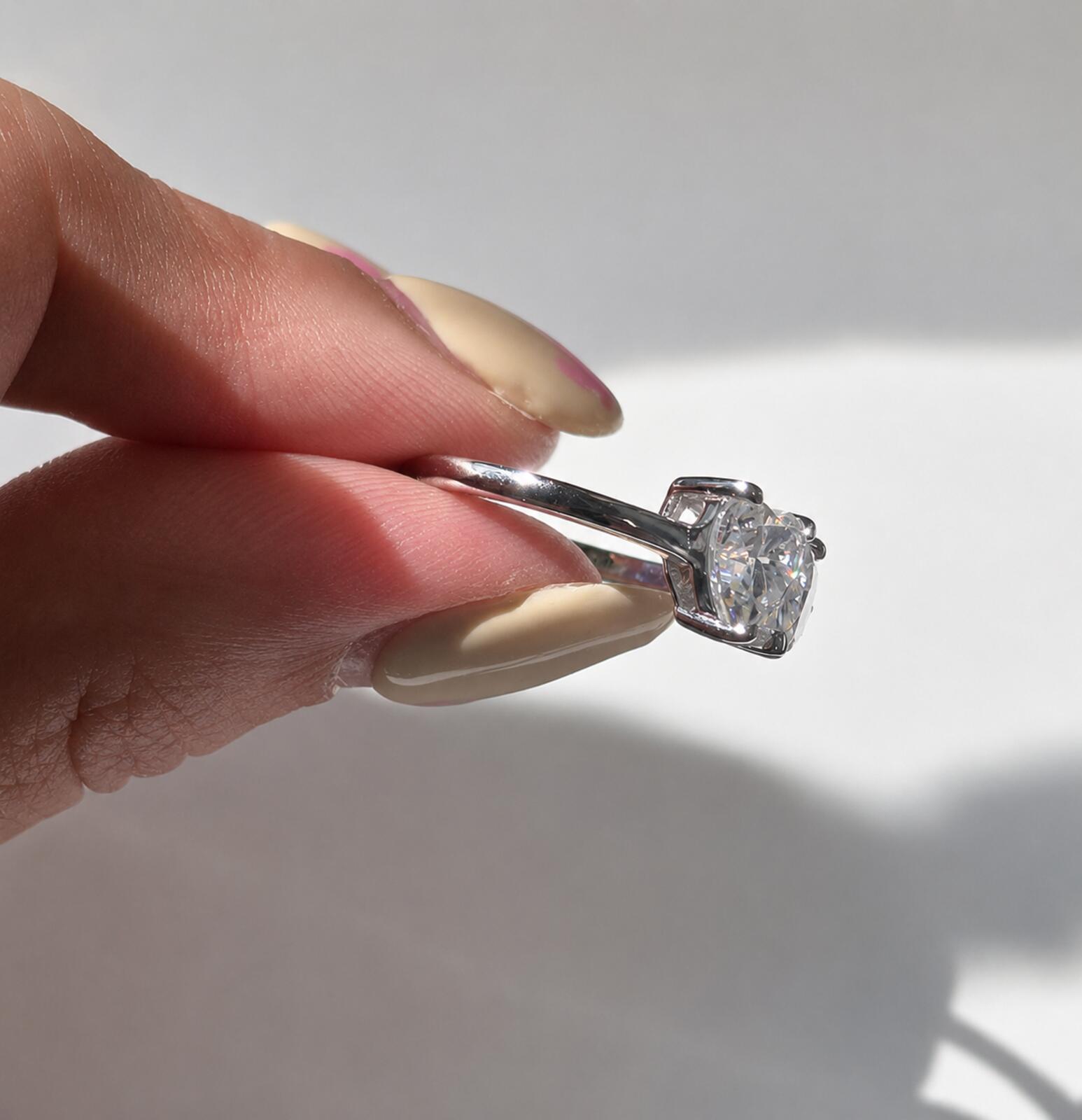 2.4ct TCW moissanite toi-et-moi ring platinum overlay
