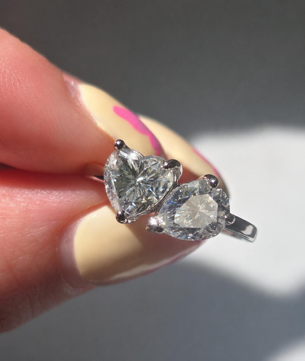 2.4ct TCW moissanite toi-et-moi ring platinum overlay