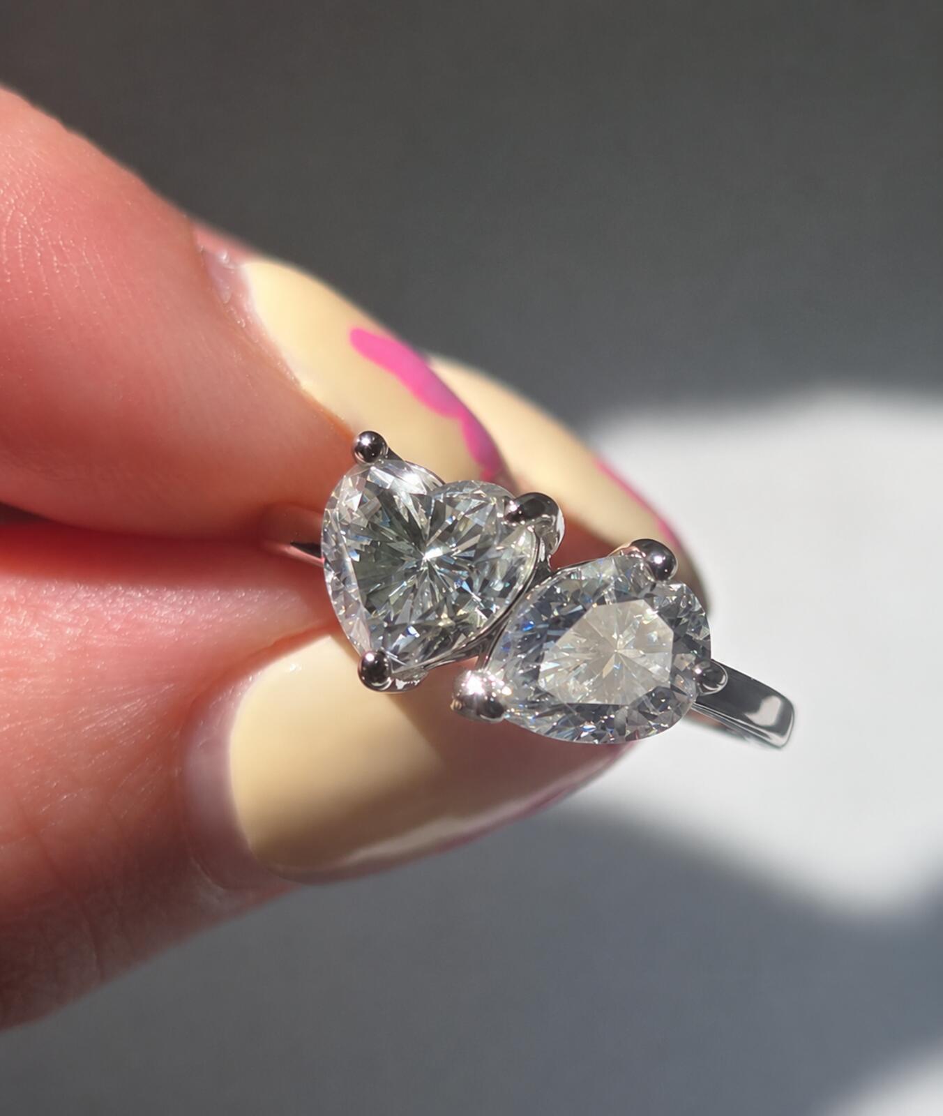 2.4ct TCW moissanite toi-et-moi ring platinum overlay